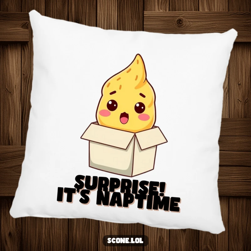 Funny scone pillow, a baked good with a shocked expression popping out of a box, offering comfort and humor.