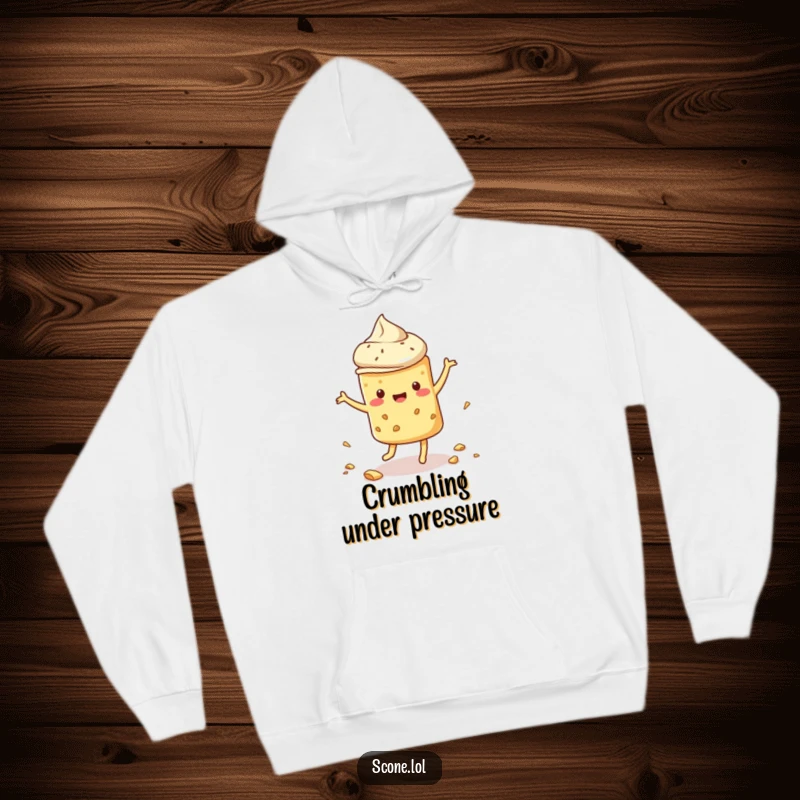 Funny scone hoodie with a scone dancing energetically and scattering crumbs, offering cozy humor and playful vibes.