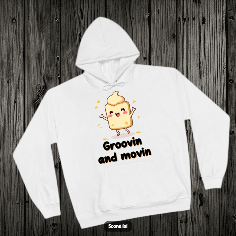 Funny Scone Hoodie: A warm hoodie featuring a happy scone character dancing amidst butter splatters, exuding funny joy.