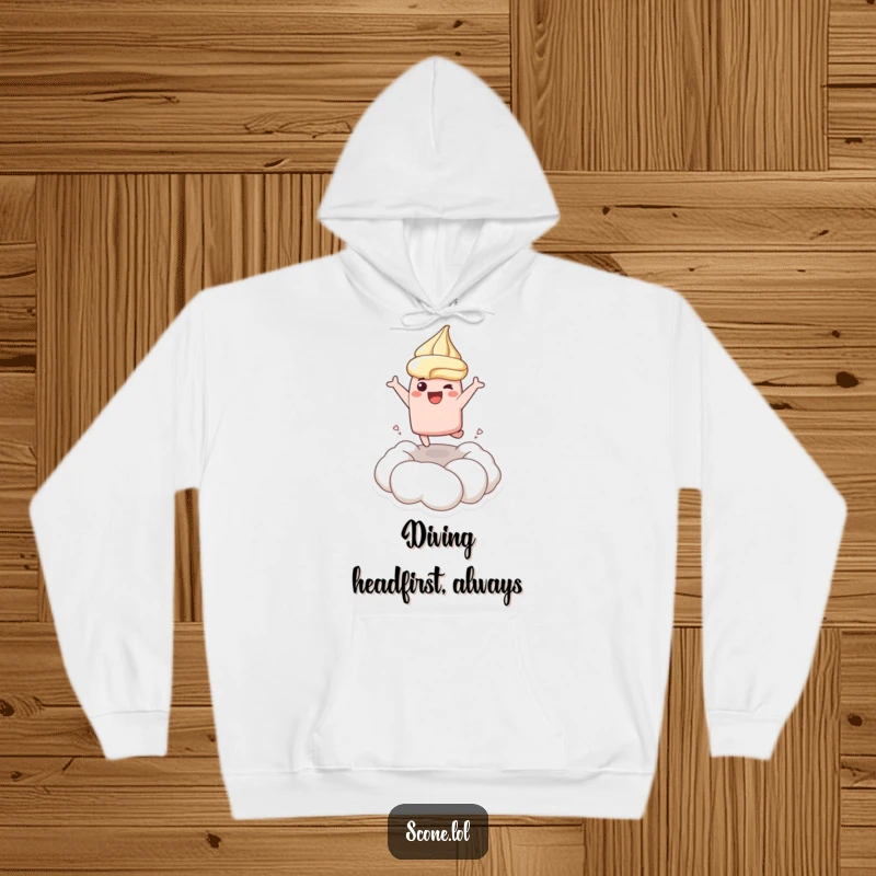 Funny hoodie featuring a scone character joyfully leaping into a cloud of cream, offering cozy comfort and cheerful vibes.