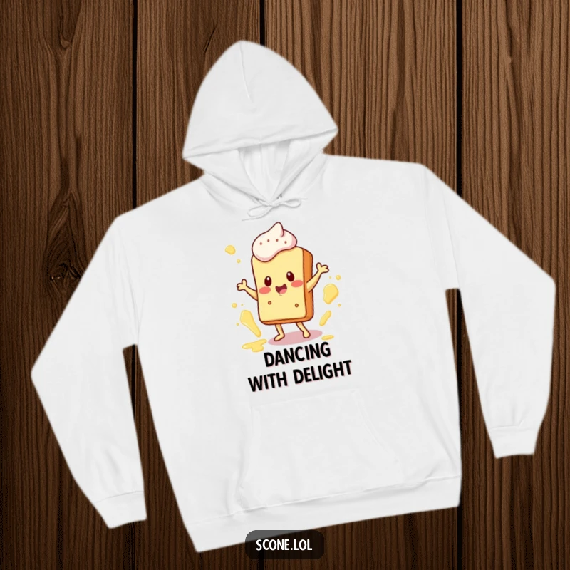 Funny Hoodie: A happy scone character is captured mid-dance with playful butter splatters, offering a cozy and humorous vibe.
