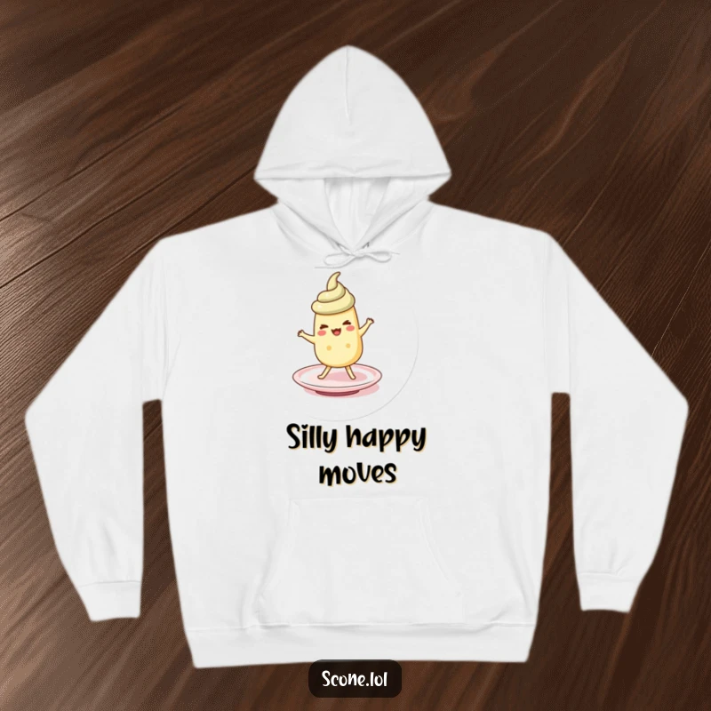 Funny scone character doing a silly jig on a saucer, on a soft and humorous hoodie.