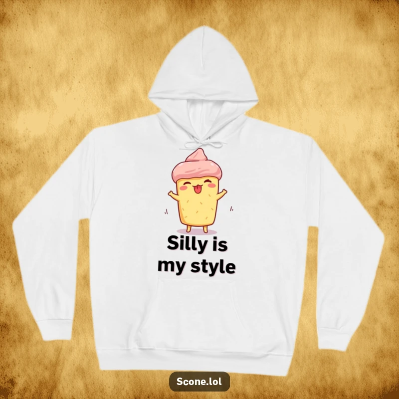 Funny scone hoodie, depicting a scone making a silly face with tongue out while spinning, offering warmth and playful humor.