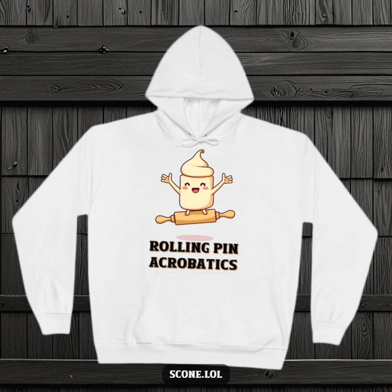 Funny hoodie featuring a scone character in a comical state of near-falling while balancing on a rolling pin, arms flailing.