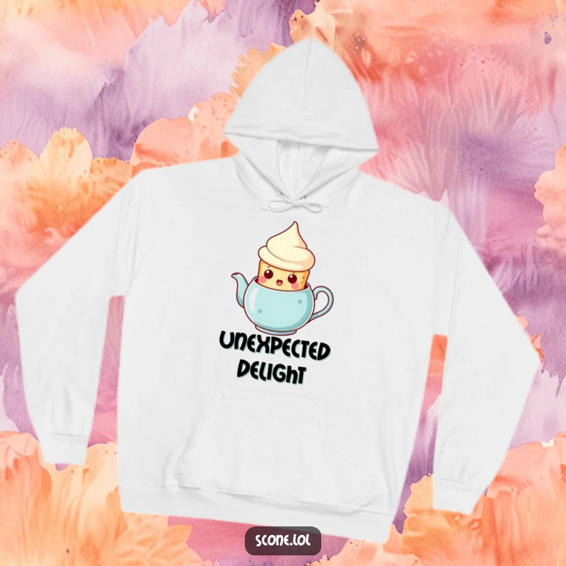 Funny scone teapot surprise hoodie, a scone popping out of a teapot with a surprised face, warm and humorous apparel.
