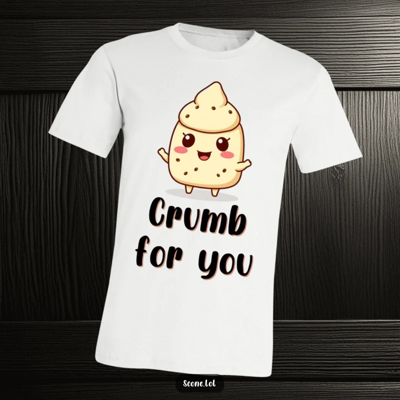 Funny scone character t-shirt showing a scone happily offering a crumb, embodying sweetness and generosity.