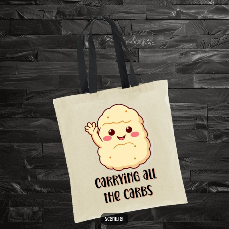 Funny scone tote bag displaying a happy, fluffy scone with a welcoming wave, perfect for carrying groceries and as a funny gift.