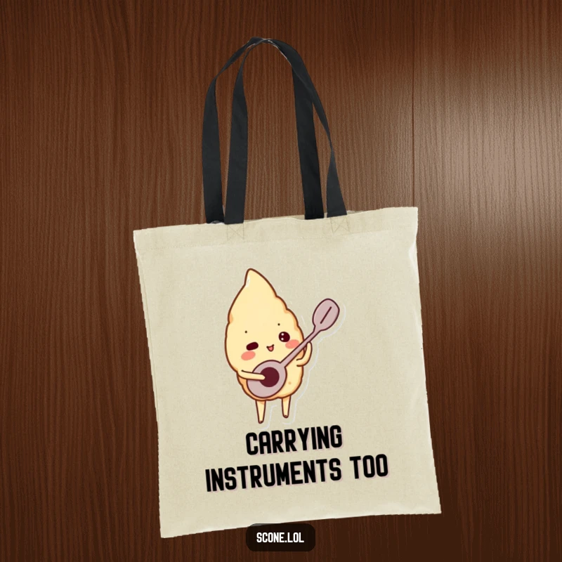Funny tote bag depicting a scone character playing a tiny spoon like a musical instrument, perfect for carrying daily essentials.