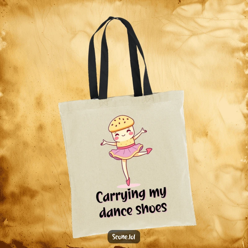 Funny scone performing a graceful, crumbly pirouette on a durable tote bag, ideal for carrying essentials.